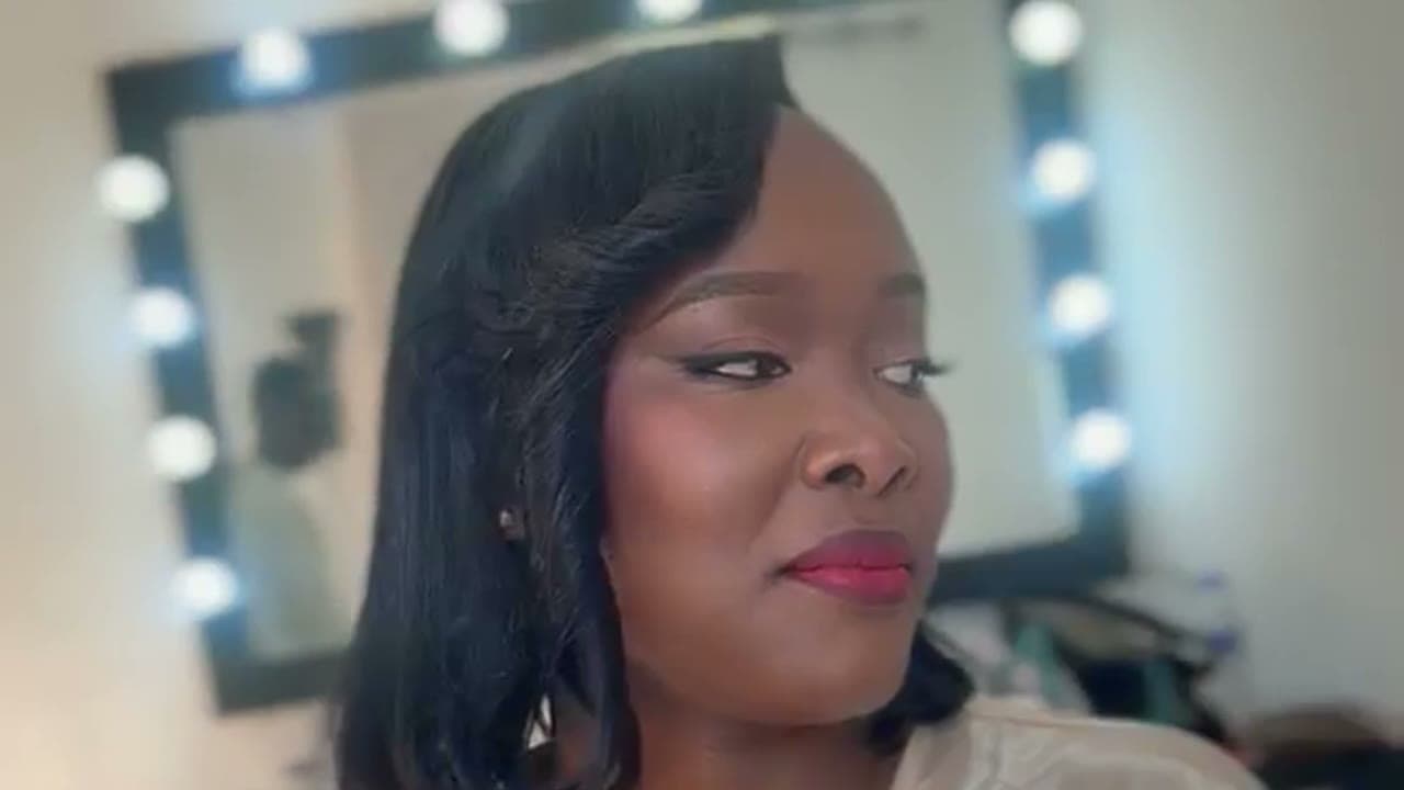 A HYLA bride at the makeup mirror