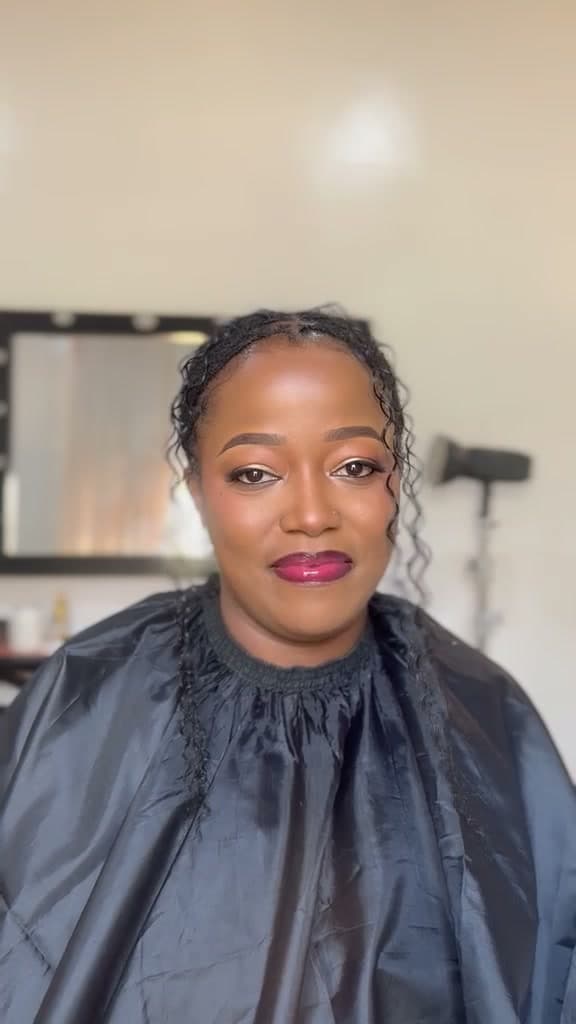 A HYLA client with soft-glam makeup and a berry lip
