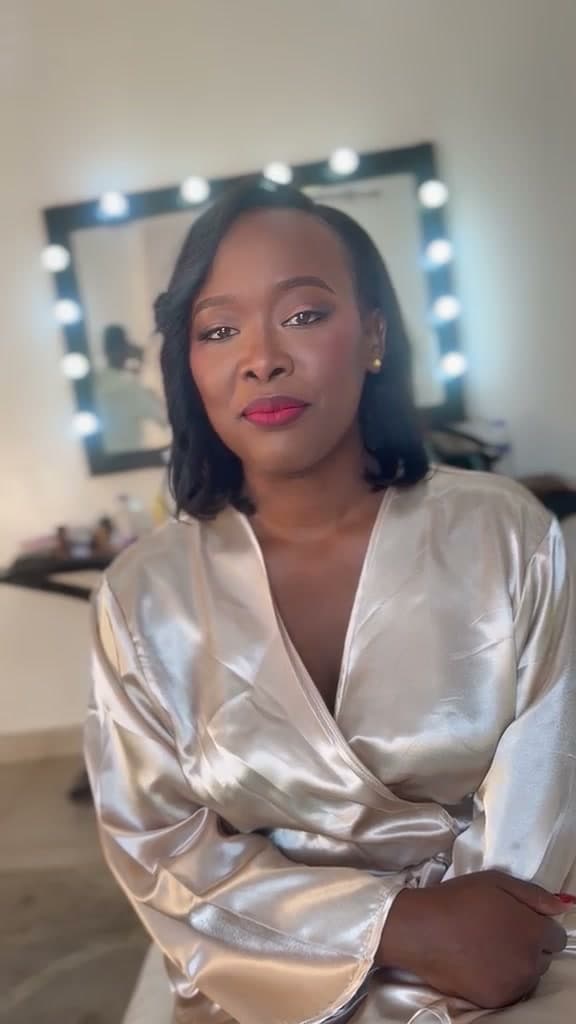 The same client, soft glam in a satin robe